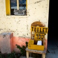 Closeup shot of a sign for a toilet Royalty Free Stock Photo