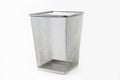 Closeup shot of a silver mesh trash can isolated on a white background Royalty Free Stock Photo