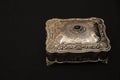 Closeup shot of silver vintage jewelry box isolated on black background Royalty Free Stock Photo