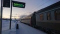 Closeup shot of an SJ night train arriving in Kiruna, Sweden in winter