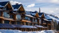 A closeup shot of a ski resorts lodge with a large array of solar panels on the roof providing energy for the building