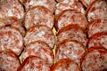 Closeup shot of slices of sausage arranged next to each other