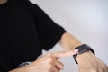 Closeup shot smartwatch, Hand wearing elegant smartwatch is a luxurious accessory