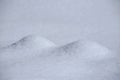 Closeup shot of snow dunes during daytime in winter Royalty Free Stock Photo