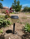 Closeup shot of a solar cell ground lamp in the garden Royalty Free Stock Photo