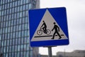 Closeup shot of a square road sign indicating the passage for pedestrians and cyclists