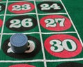 Closeup shot of a stack of casino chips on black 29 on a roulette Royalty Free Stock Photo