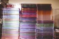Closeup shot of a stack of CDs on a blurred background Royalty Free Stock Photo