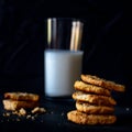 Closeup shot of a stack of cookies on a black surface