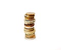 Closeup shot of stack of mixed rusty old coins isolated on a white background Royalty Free Stock Photo