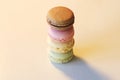 Closeup shot of a stack of sweet colorful macarons