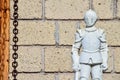 Closeup shot of a statue of a soldier near the wall Royalty Free Stock Photo