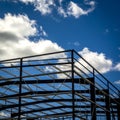 Closeup shot of steel structure under construction on a clear sky background Royalty Free Stock Photo
