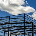 Closeup shot of steel structure under construction on a clear sky background Royalty Free Stock Photo