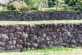 Closeup shot of stone walls at Tambomachay, Inca archaeological site in Cusco, Peru
