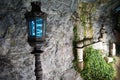 Closeup shot of a street lamp in a cave