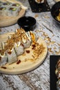 Closeup shot of sushi rolls served on a wooden plate Royalty Free Stock Photo