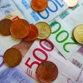 Closeup shot of Swedish banknotes and coins