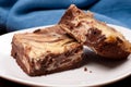 Closeup shot of swirl vanilla cheesecake chocolate brownies with cream cheese Royalty Free Stock Photo