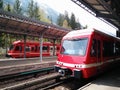 Closeup shot of Swiss red trains waiting on the train station in Chur, Switzerland