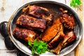 Closeup shot of tasty grilled meat barbeque on the plate Royalty Free Stock Photo