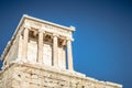 Closeup shot of the temple of Athena Nike with the background of beautiful blue sky Royalty Free Stock Photo