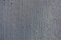 Closeup shot of a textured wall painted gray with brush strokes Royalty Free Stock Photo