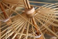 Closeup shot of thatch umbrella wooden frames
