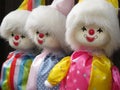 Closeup shot of three vintage clown dolls