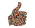 Closeup shot of a thumbs up figure made of colorful beads on an isolated background Royalty Free Stock Photo