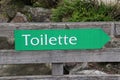 Closeup shot of a Toilette sign Royalty Free Stock Photo