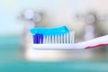 Closeup shot of a toothbrush with a strip of blue toothpaste Royalty Free Stock Photo