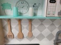 Closeup shot of toy kitchen utensils set up on a kiddy indoor playground