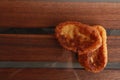 Closeup shot of traditional Spanish torrijas on a wooden surface