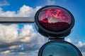 Closeup shot of a traffic light with red for cyclists