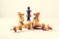 Closeup shot of two fallen king chess pieces-business, strategy concept Royalty Free Stock Photo