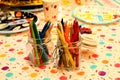 Closeup shot of two jars with colorful crayons Royalty Free Stock Photo