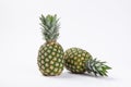 Closeup shot of two ripe pineapples isolated on white background Royalty Free Stock Photo