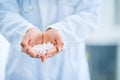 They could offer the prevention and cure you need. Closeup shot of an unidentifiable doctor holding a variety of pills Royalty Free Stock Photo