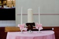 Closeup shot of a unity candle on a table