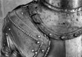Closeup shot of the upper part of the armor of a medieval knight