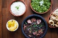 The perfect rustic meal. Closeup shot of various bowls of food and ingredients.