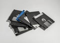 Closeup shot of various old floppy disks on white background Royalty Free Stock Photo