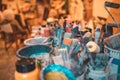 Closeup shot of various paintbrushes, tubes of paint, artistic tools and equipment in a studio