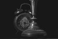 Closeup shot of vintage alarm clock on dark background Royalty Free Stock Photo
