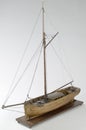 Closeup shot of a vintage figurine of a ship isolated on a white background