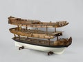 Closeup shot of a vintage figurine of a ship isolated on a white background