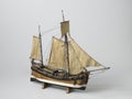 Closeup shot of a vintage figurine of a ship isolated on a white background