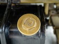 Closeup shot of a vintage fuel tank cap from an antique Fiat car