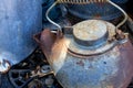 A vintage iron tea kettle